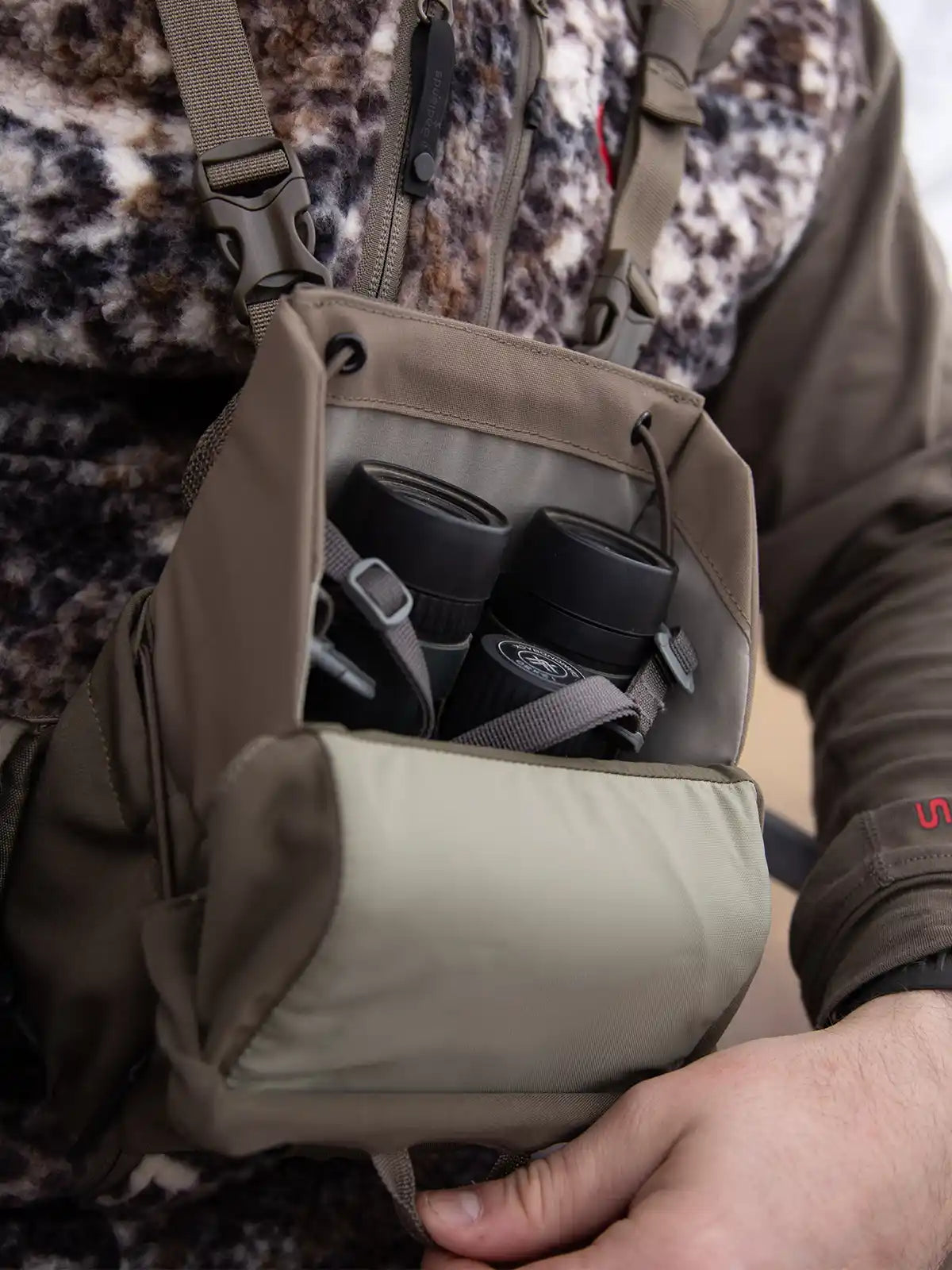 binoculars placed in Moonrivers bino harness