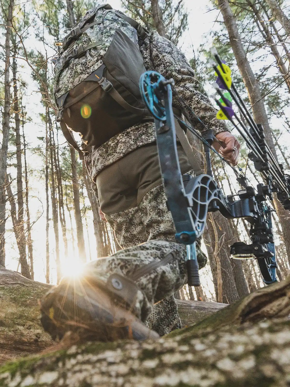 closeup of bow hunter in the forest