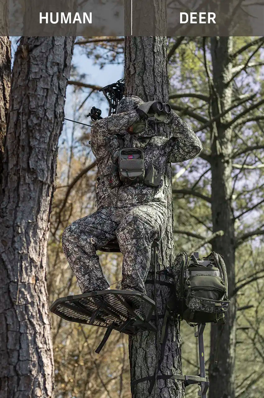 Hunter in Moonrivers camo sits in a tree stand, using binoculars; Moonrivers skull logo visible on chest pack.