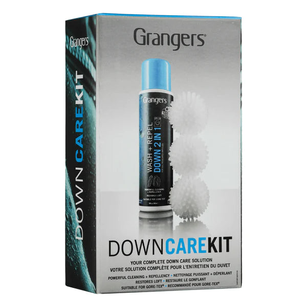 Grangers Down Care Kit box with wash solution bottle and three white dryer balls for cleaning and caring for down items.