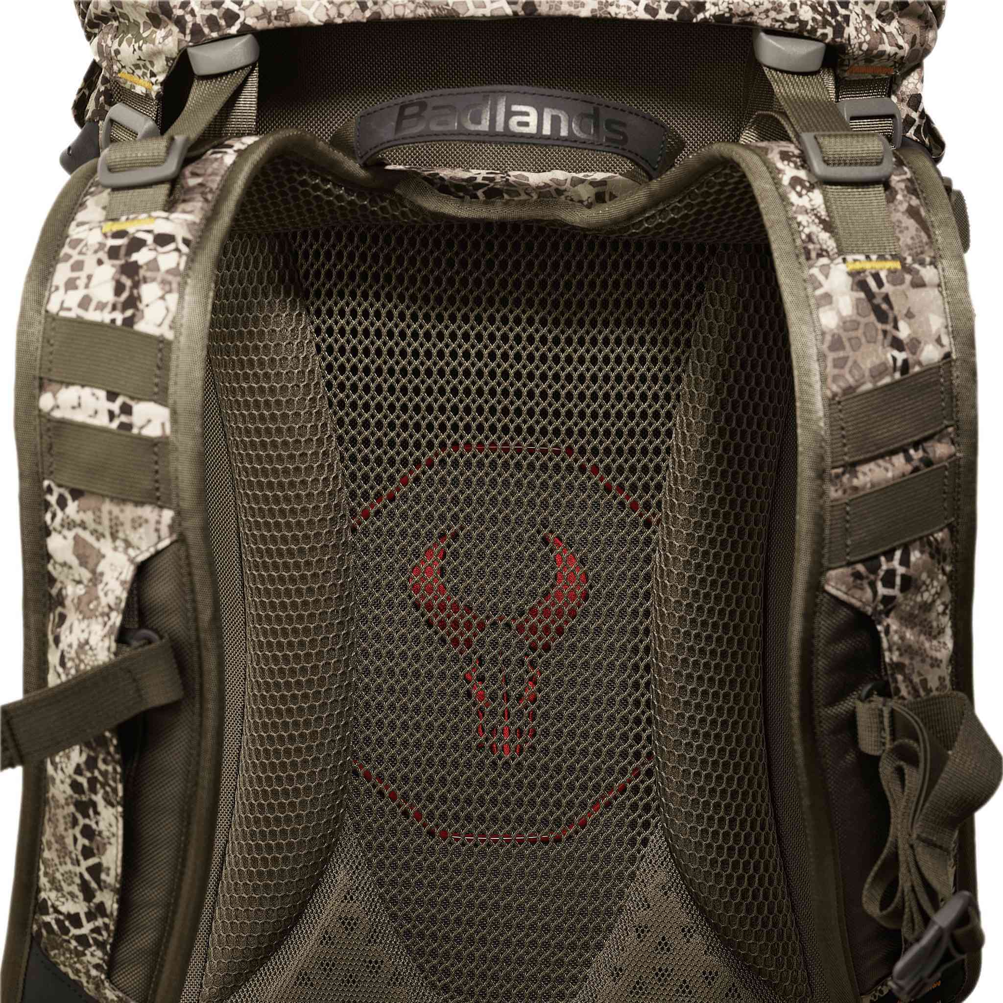 Close-up of a Moonrivers camo backpack with mesh back panel and visible red Moonrivers skull logo.
