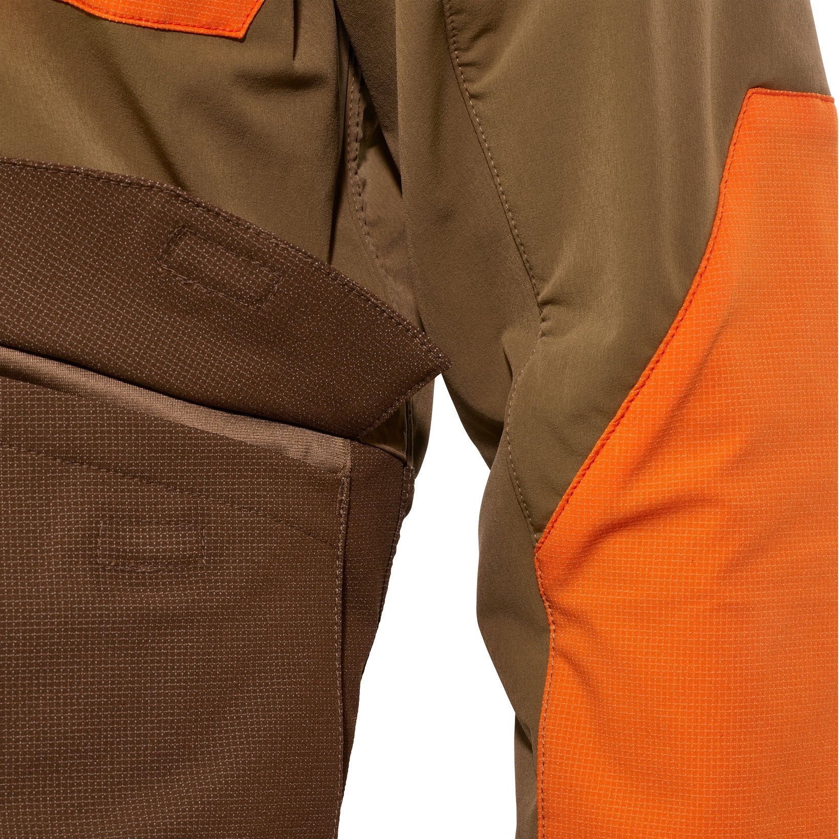 Close-up of brown and orange hunting pants with a pocket and durable fabric, featuring the Moonrivers Logo.